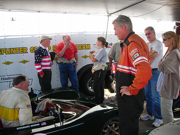 The aging alter ego of Buddy Palumbo borrows another race car. (In the background, B.S. Levy has apparently borrowed a cigarette.)