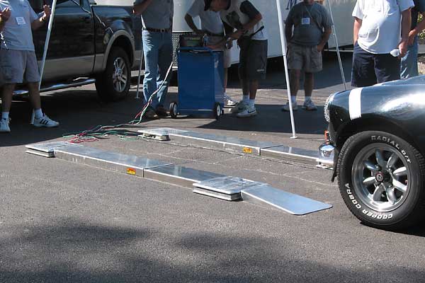 Peter Smith's MGB is pulling onto the Longacre scales