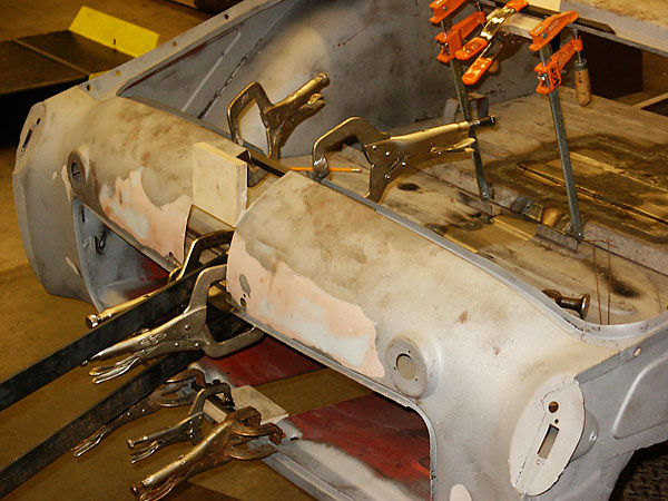 getting the body into alignment with welding clamps