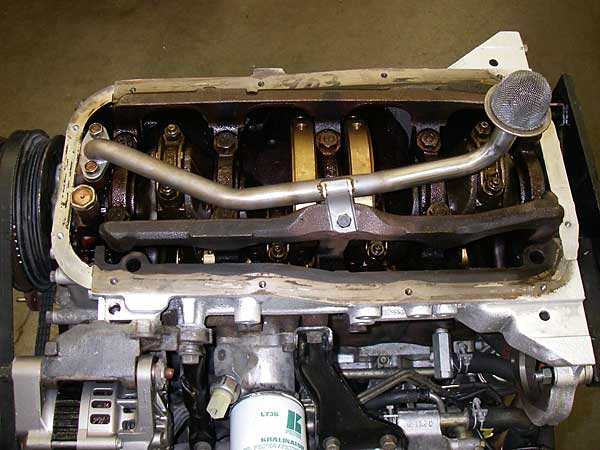 custom fabricated pick-up routed to rear oil sump