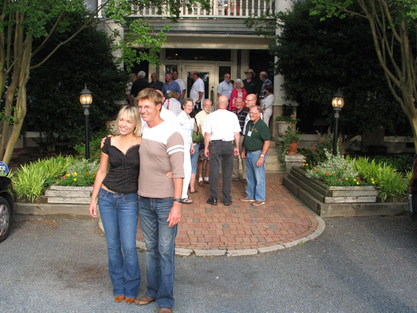 The lovely young couple poses for a photograph...