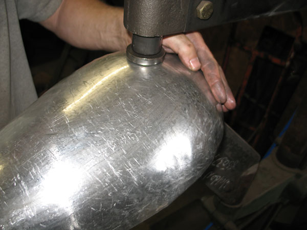 Here James is working the middle of the workpiece using a relatively flat bottom die.