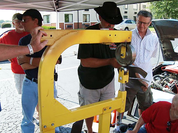 Jim Blackwood takes a turn at transforming a blank of thin flat steel into a smooth compound curve.