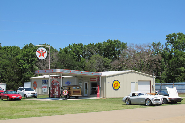 Hatfield Restorations' model gas station (with showroom inside).