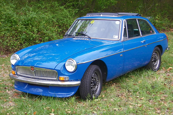 Chrome bumper conversion, MGB MkI (1962-69) grille, and MGB Special Tuning spoiler.