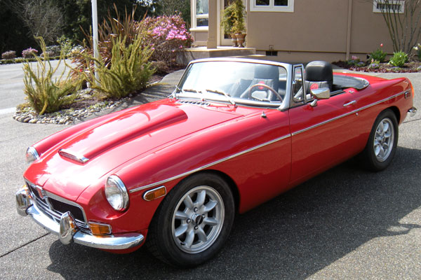 Chrome bumpers with early style (62-69, all metal) overriders.