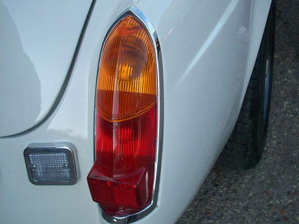 Early model MGB rear light clusters.