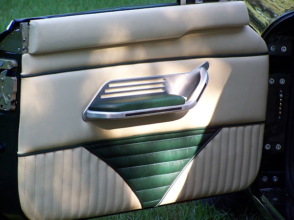 Big Al's Carponents brand Marque arm rests/door pulls on custom door panels.