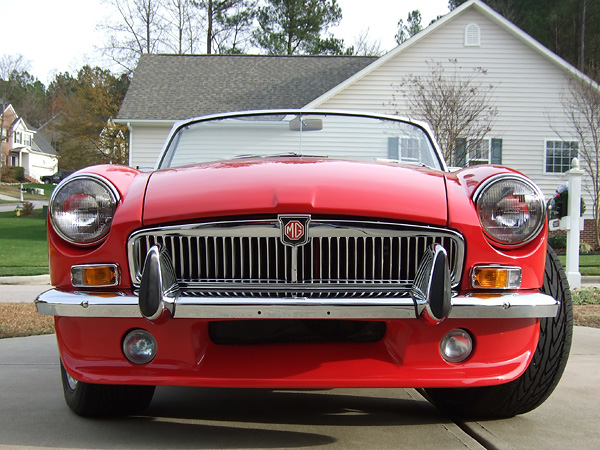 Functional air inlet and driving lights in the Special Tuning fiberglass air dam.