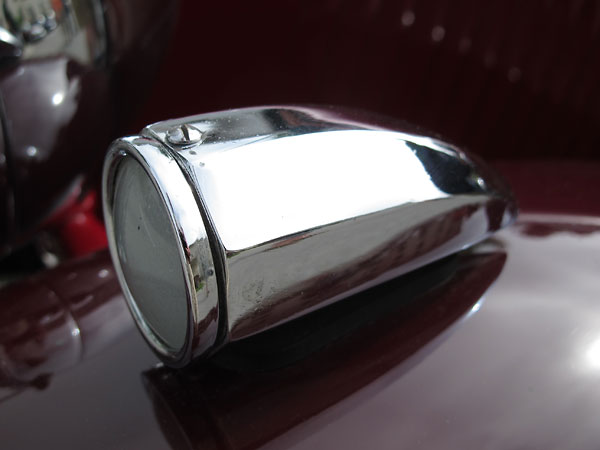 Fender mounted marker lights, octagonal in cross-section.