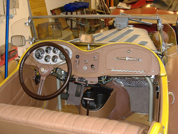 The dashboard was custom fabricated, but it's consistent with the MG aesthetic.