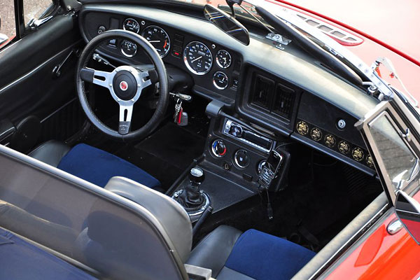 Modified (narrowed) MGF seats in blue alcantara and black leather.