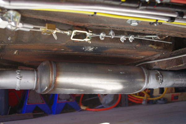 Single Magnaflow stainless steel muffler.