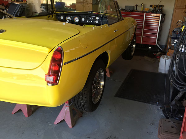 Modified 1967 taillamps, featuring specially built-in back up lights.