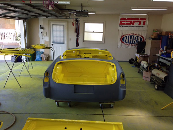 The engine-side of the bonnet was painted before its reinstallation.