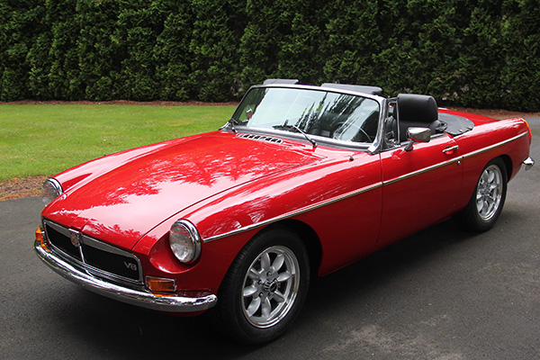 MG began fitting a third windshield wiper on 1969 MGB roadsters.