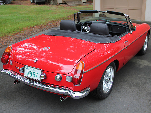 Rear bumper fillers were fabricated, welded in place and painted body color.