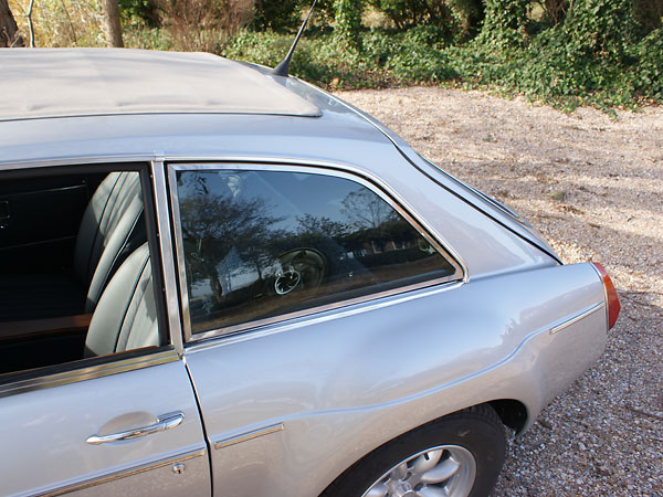 Rear seat removed and replaced with custom speaker and Pioneer amplifier installation.