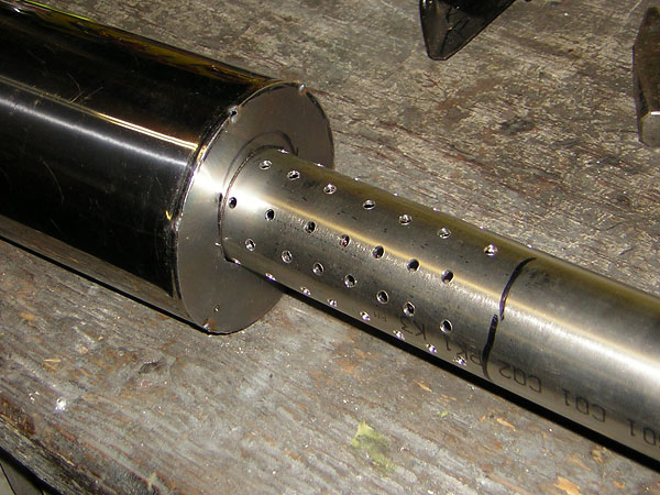 Home-made stainless steel muffler.