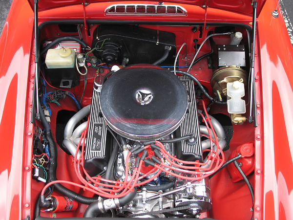 Fast Cars through-the-fender exhaust headers, with Jet Hot coating.