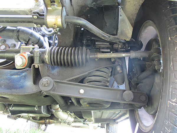 Stock MGB front suspension, with World Wide Auto Parts rebuilt Armstrong shock absorbers.