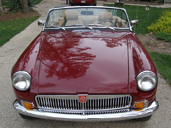 Dupont base-coat / clear-coat paint, in Jaguar Regency Red.