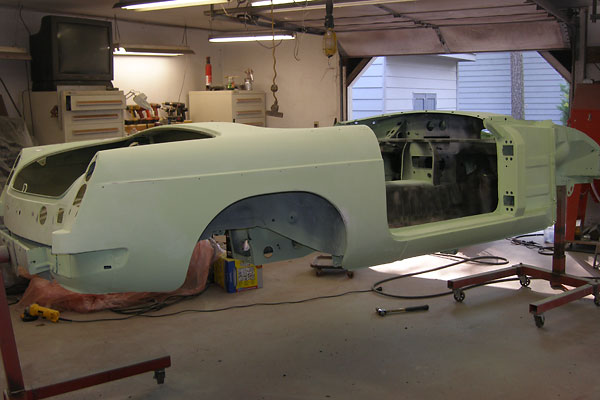 Underneath the taillamps, new metal has been added as part of the chrome bumper conversion.