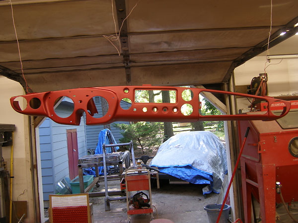 MGB MkI dashboard with added gauge positions and holes for AC vents.