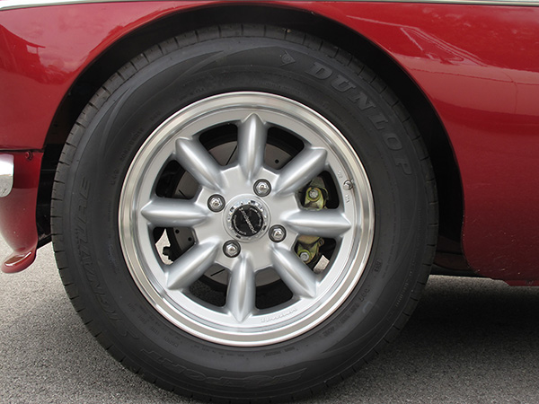 Panasport 15x6 aluminum wheels.