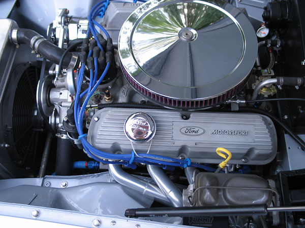 Summit Racing drop-base air cleaner (SUM-239433), modified for choke clearance.
