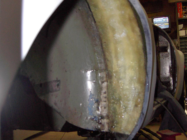 fiberglass resin bonds filler panels to steel inner fenders and fiberglass Huffaker flares.