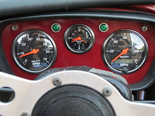 Autometer HotRod Designer Black gauges: tachometer (0-7000rpm), clock, & speedometer.