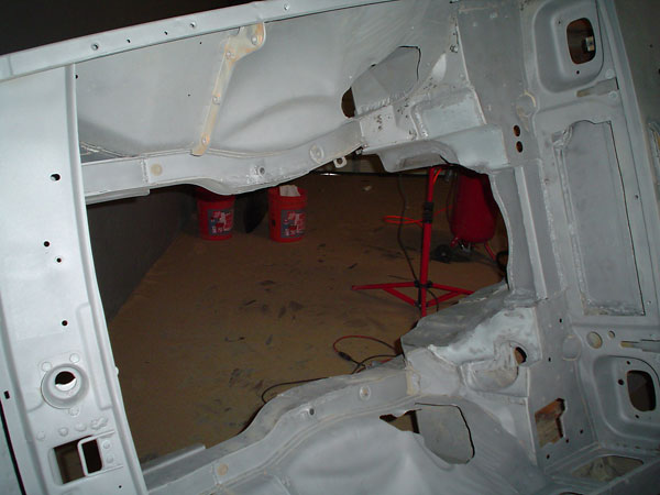 The bottom of Rob's MGB was sand blasted, and the top surfaces were chemically stripped.