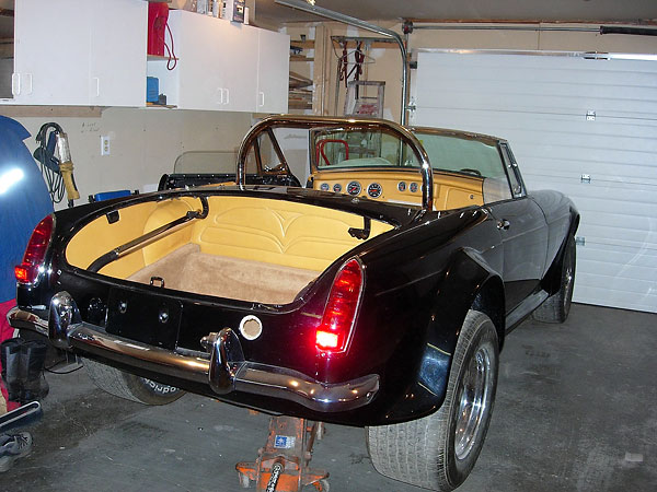 Leather upholstered trunk.