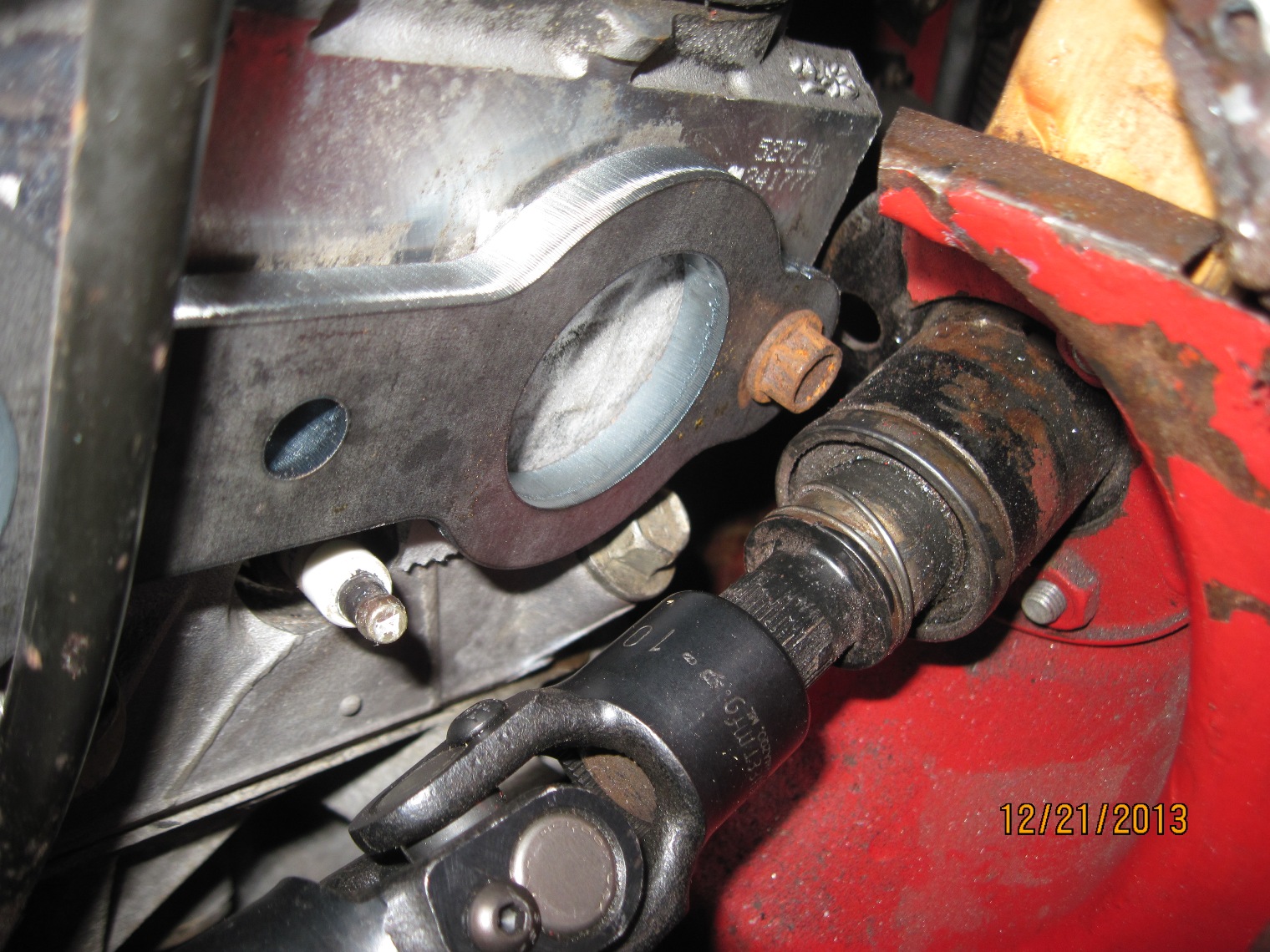 Steering shaft to exhaust port clearance.