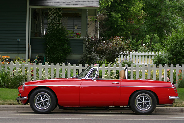 Scott removed ~7 coats of old paint. This MGB was originally painted bronze yellow.