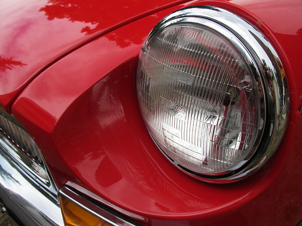 MGB headlight trim rings.