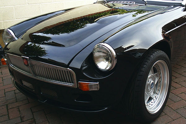 Modified MGC-style fiberglass bonnet.