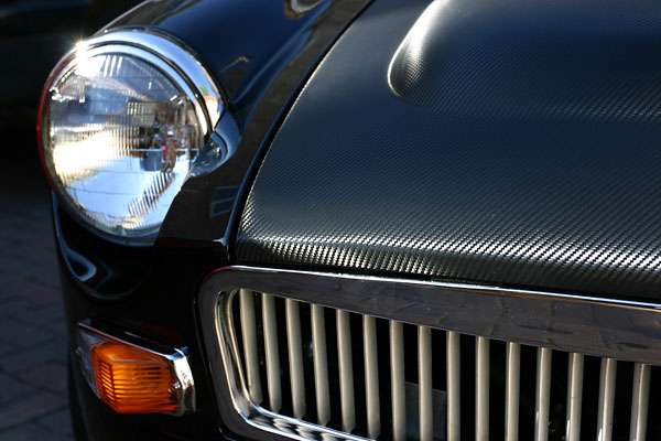 A textured film has been applied over the bonnet to present the appearance of carbon fiber.