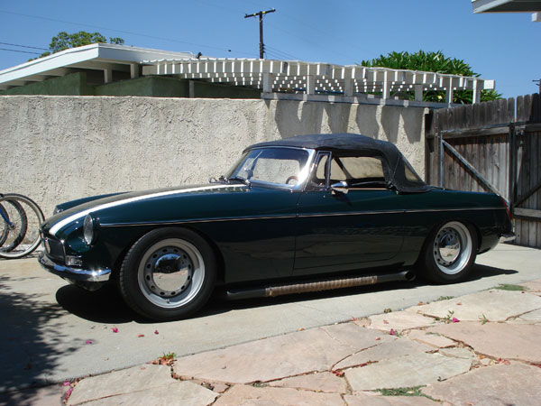 Stock MGB disk wheel centers mounted on 15x7 rims. Baby moon hubcaps.