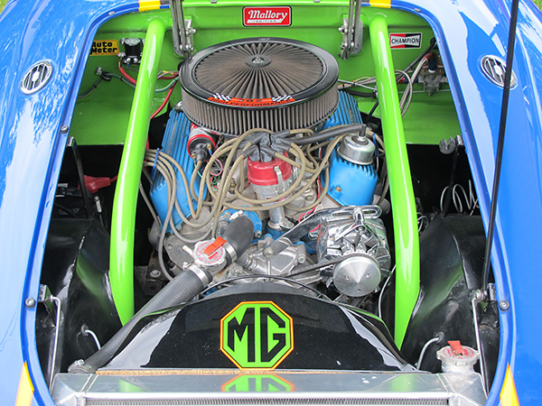 Ford 302, bored 0.030 over and rebuilt with 9.5:1 compression ratio hypereutectic pistons.