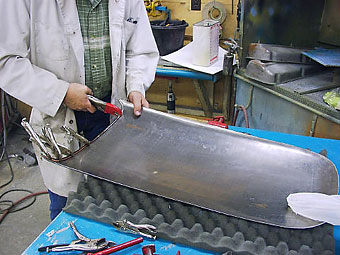Jim Bailie, wire edging the front of the hood scoop