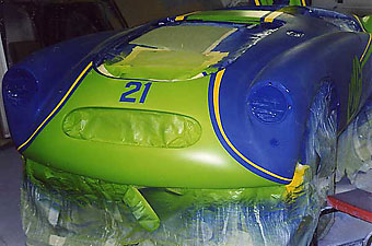 applying green paint