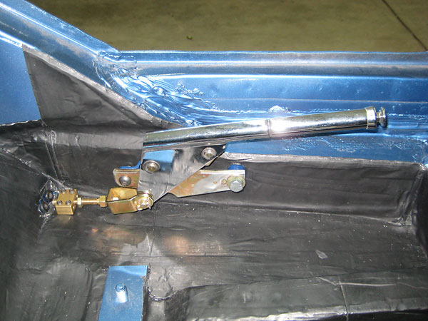 Lokar parking brake cable attachment.