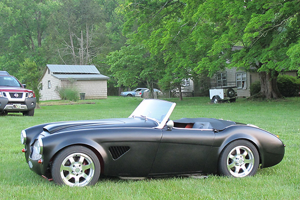 Hot Rod Black matte finish. Custom front fender louvers.