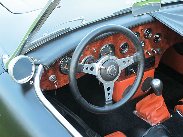 Custom wood dashboard crafted from an African hardwood called Babinga.