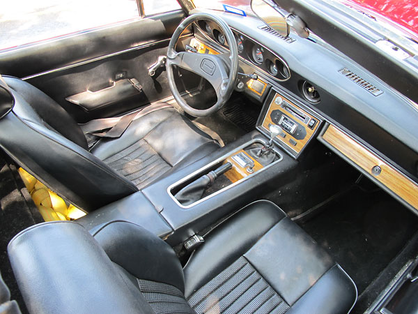 Almost entirely stock Jensen Healey interior.