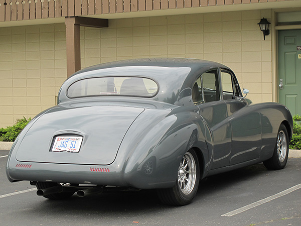 Original bumper, rear lamps, and license plate frame have been removed.