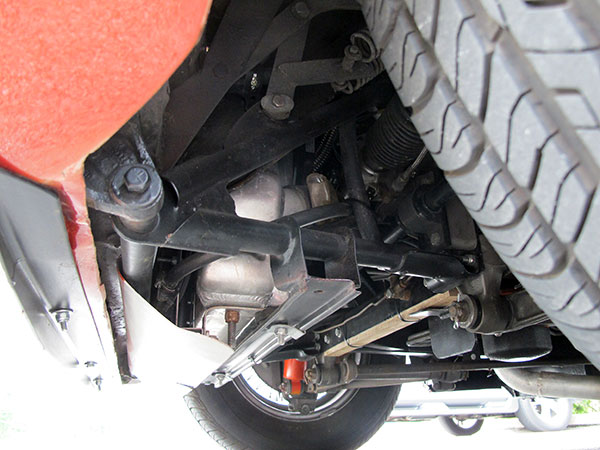 Jaguar E-type bonnet hinge and support structure.