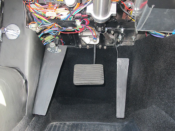 Dead pedal and highbeam/lowbeam selector switch.